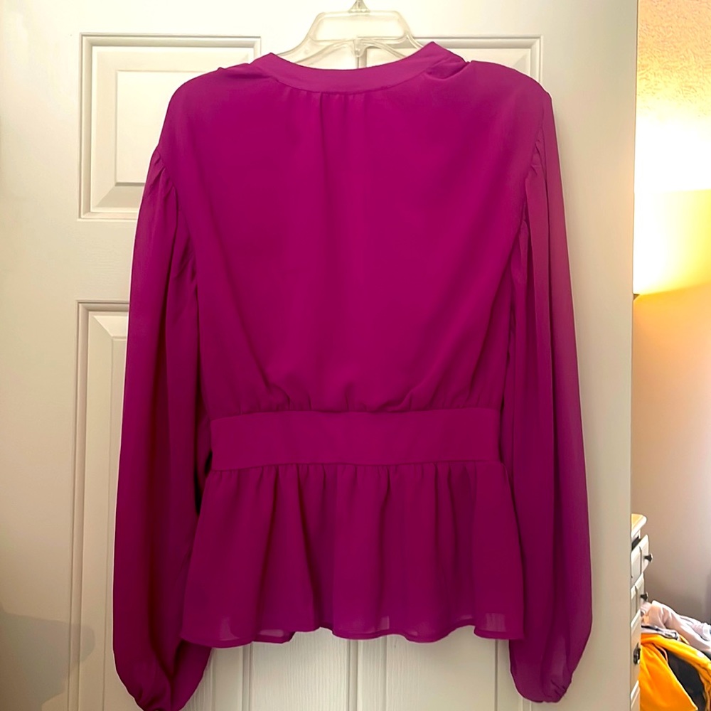 Peplum style blouse